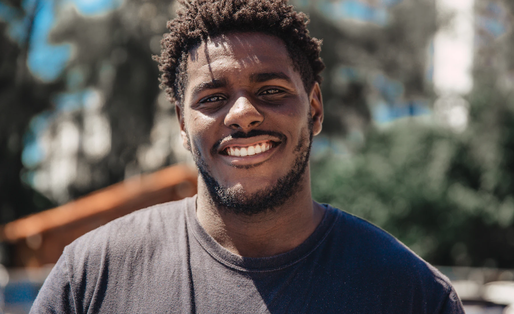A Kenyan worker in Dubai smiling
