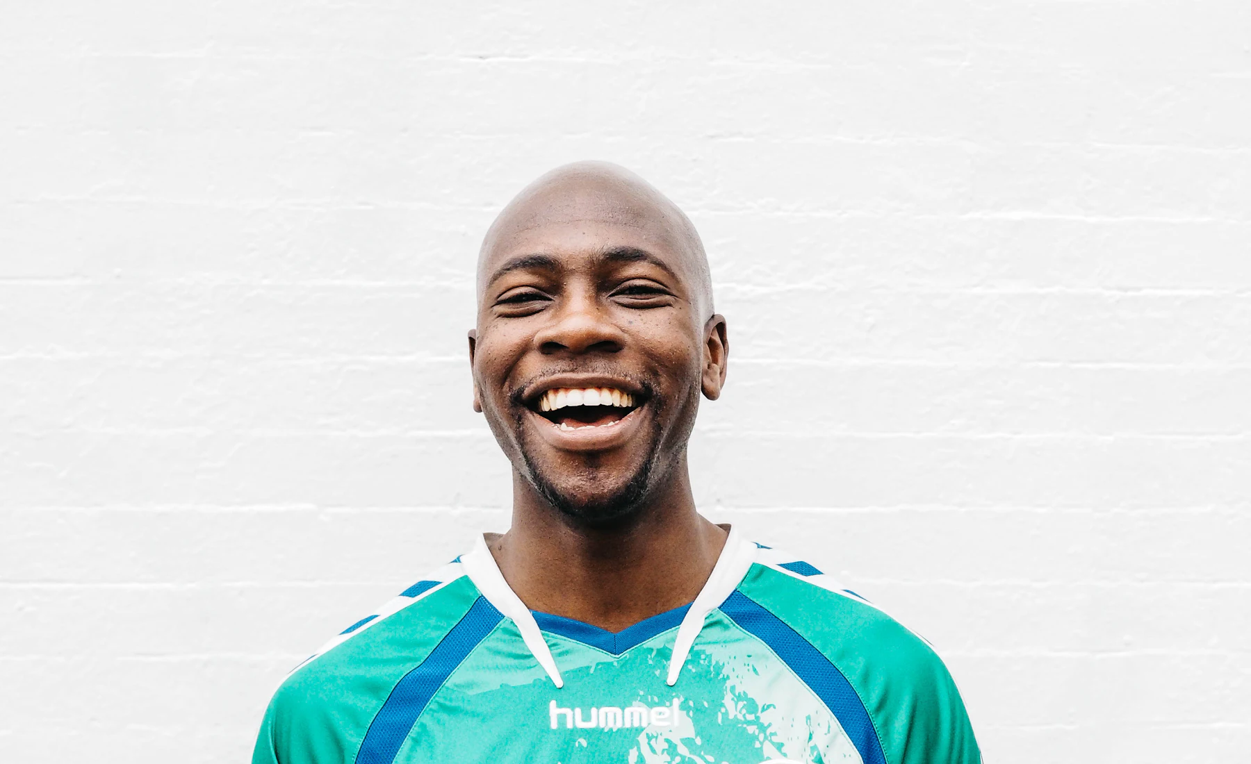 A Sierra Leonean worker smiling in Dubai