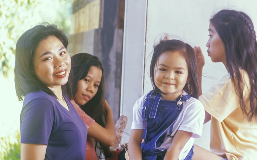 Her kids grinning at home in Cebu